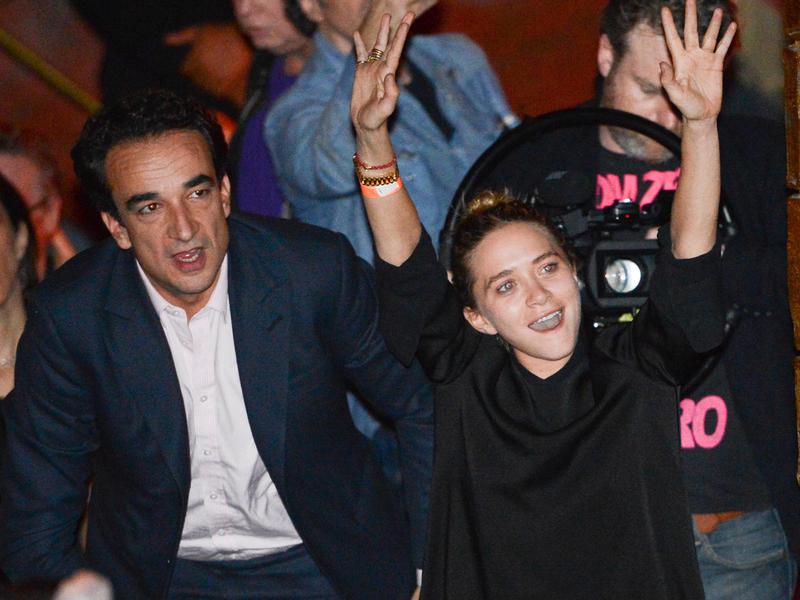Mary-Kate Olsen and then-boyfriend Olivier Sarkozy in the audience at The Cutting Room to see Ronnie Wood of the Rolling Stones perform with guitarist Mick Taylor, drummer Simon Kirke and keyboardist Al Cooper on Nov. 7, 2013 in New York.